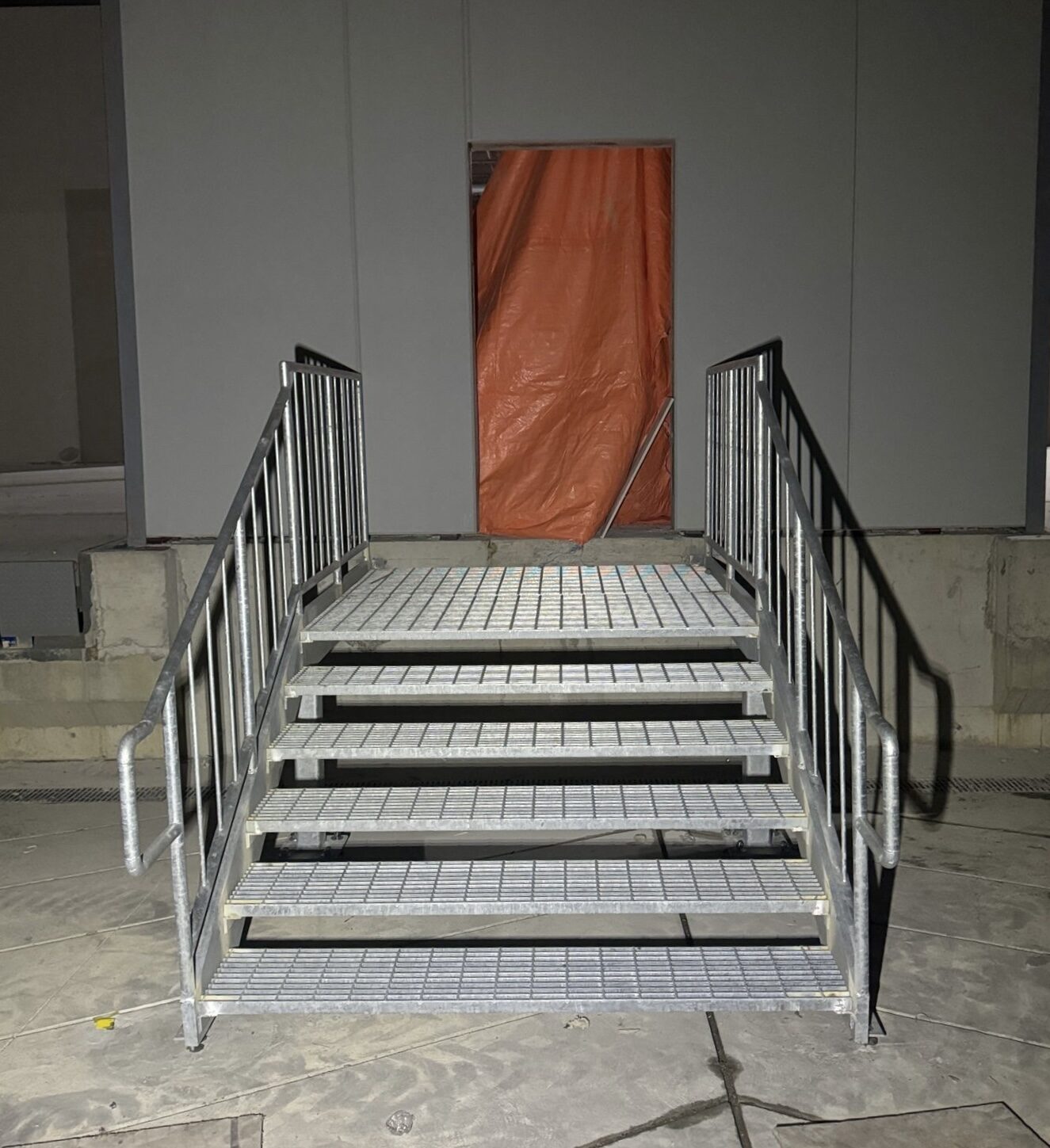 Custom steel staircase and landing framing by Weld Plus