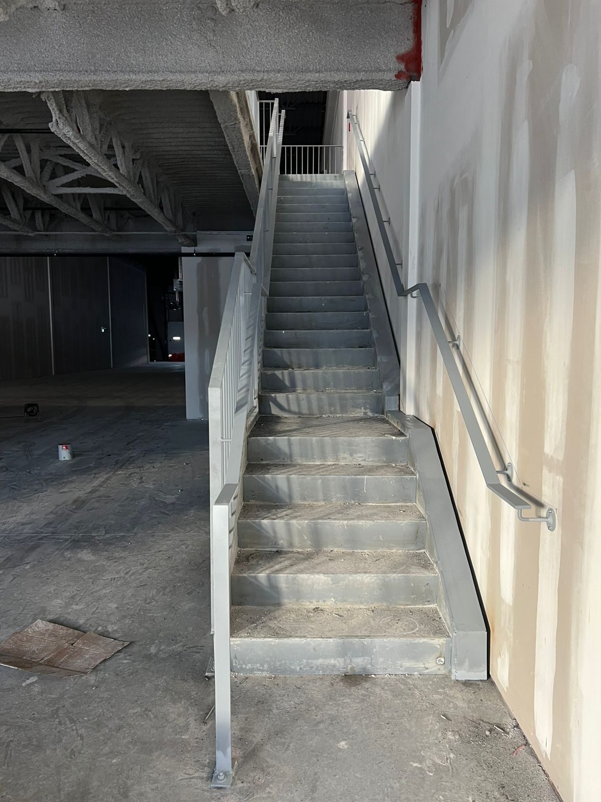 Custom steel staircase and landing framing by Weld Plus