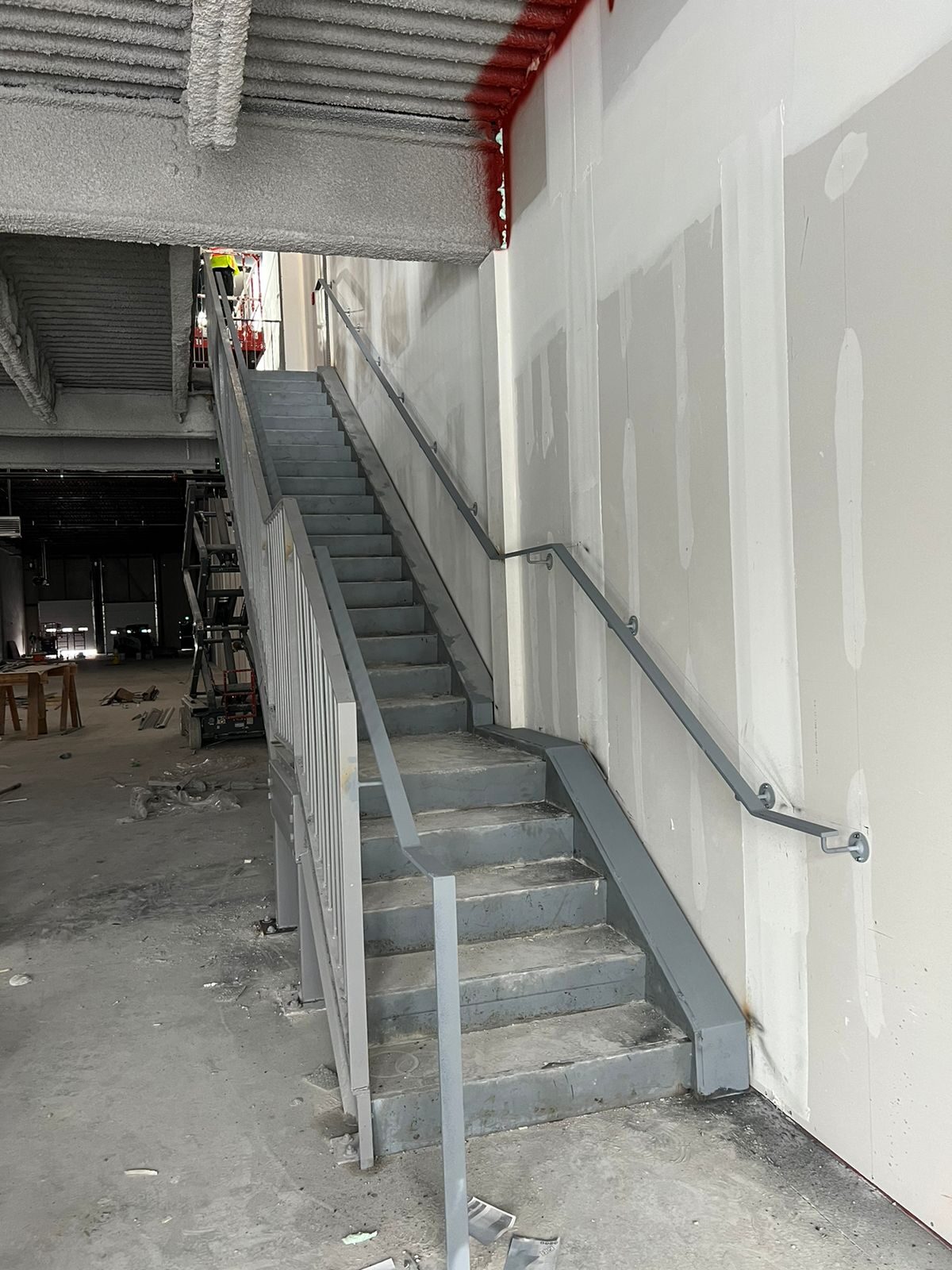 Custom steel staircase and landing framing by Weld Plus