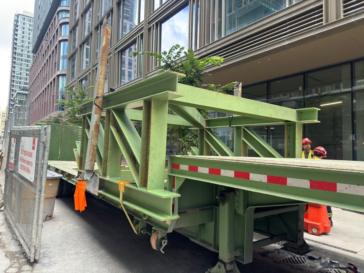 Heritage masonry facade retained by a temporary structural steel frame, downtown Toronto