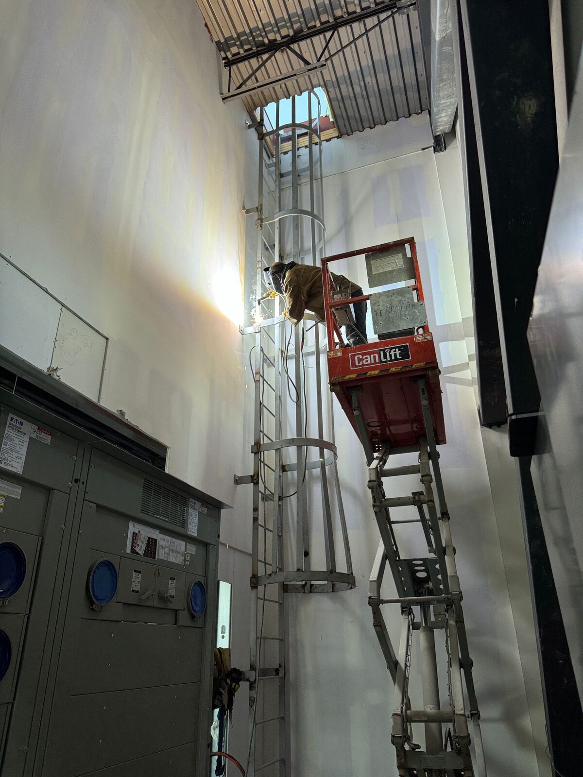 Steel access ladder and fire escape fabricated by Weld Plus