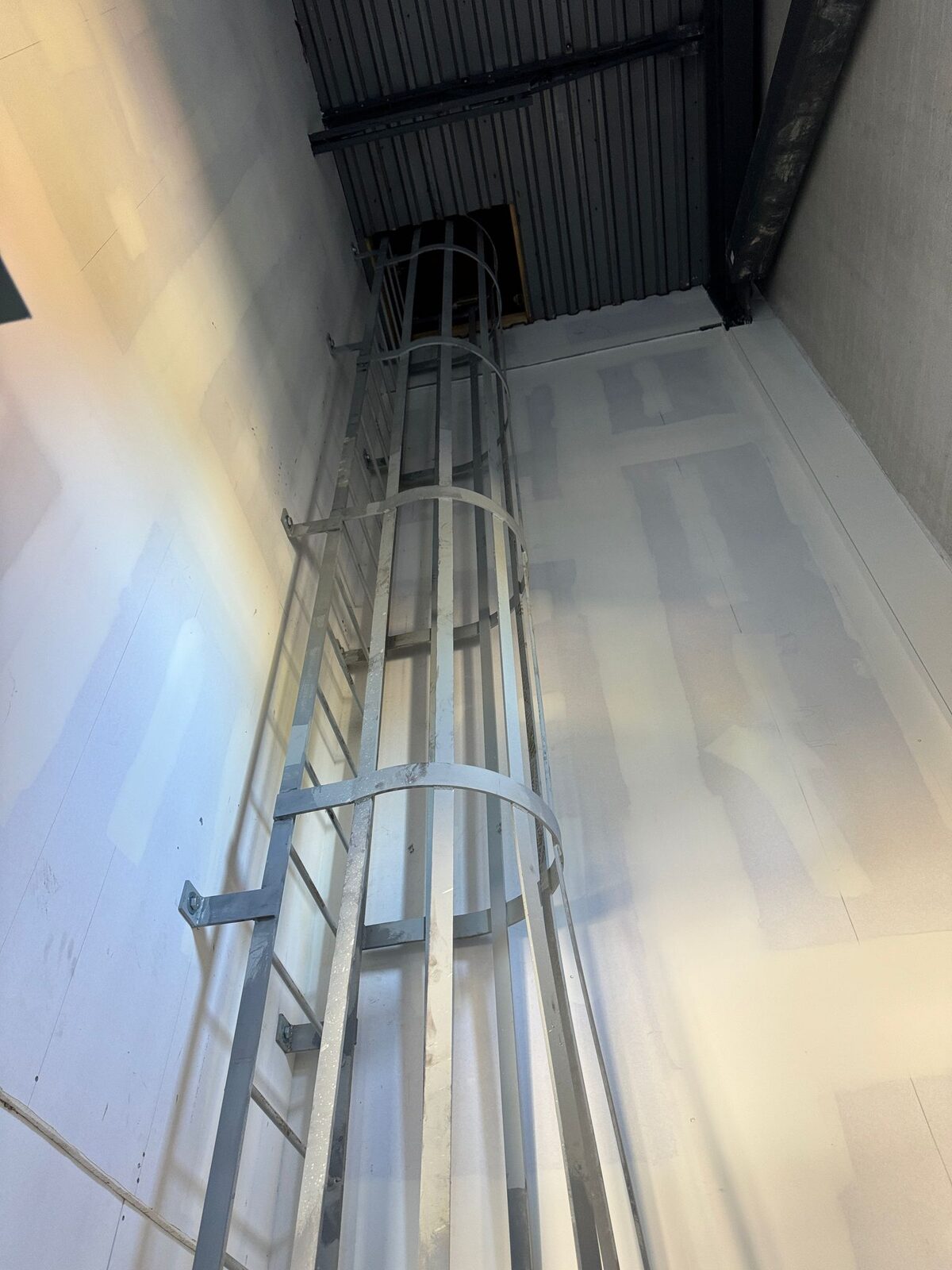 Steel access ladder and fire escape fabricated by Weld Plus